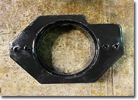 small black polyurethane part.